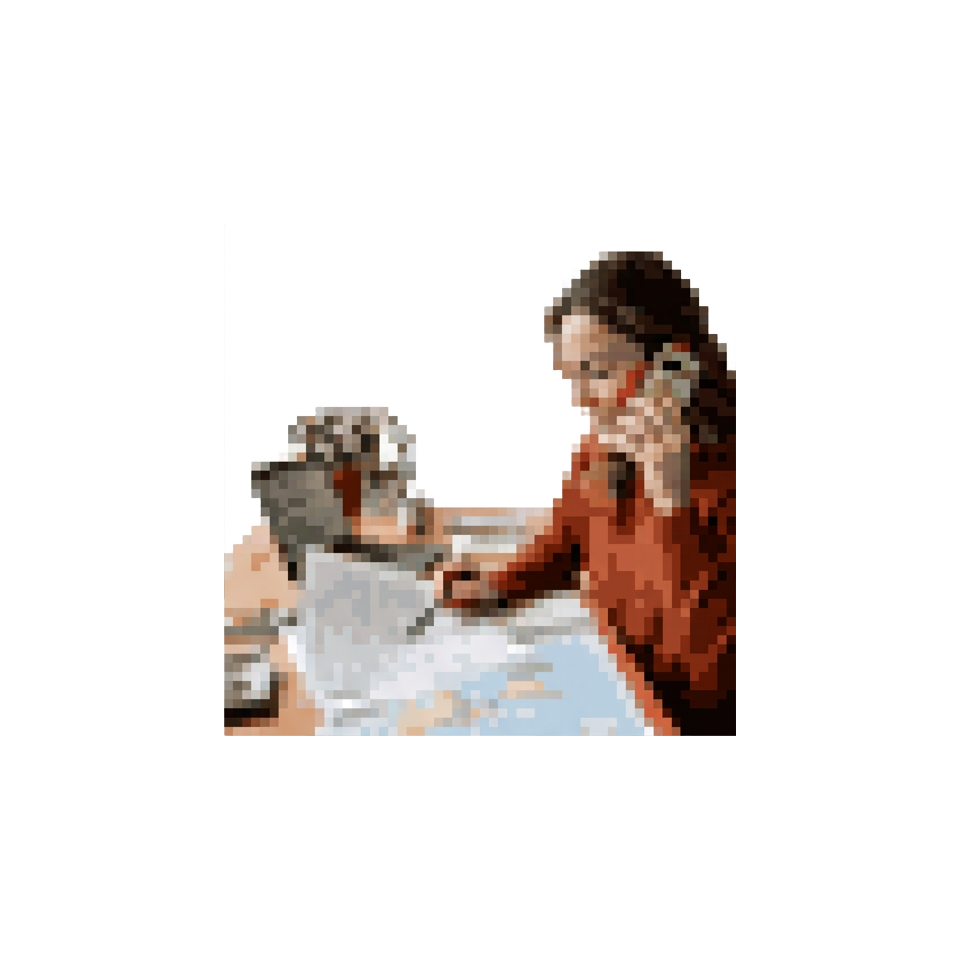Travel advisor reviewing a draft itinerary while talking with a client on the phone